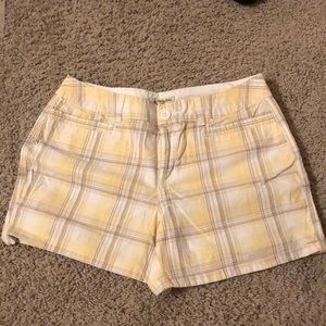 light yellow, white and gray plaid shorts